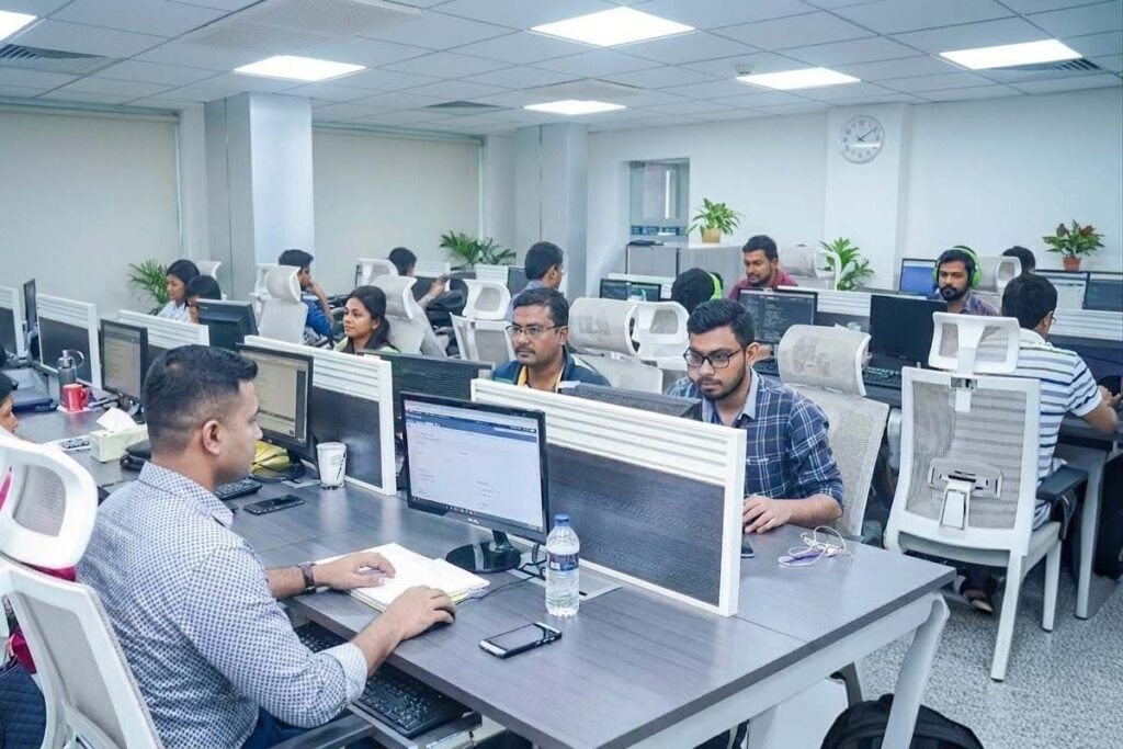 LumeRetouch professional photo editing studio workspace with team of expert editors working on eCommerce product images